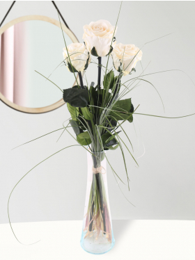 Three cream coloured long life roses with glass vase